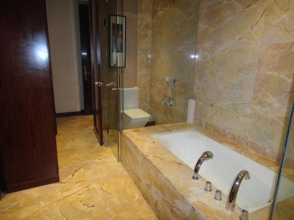 Ondine International Hotel Zhenjiang  Oda fotoğraf